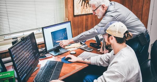 ETSU public health student with professor reviewing health data on a computer screen
