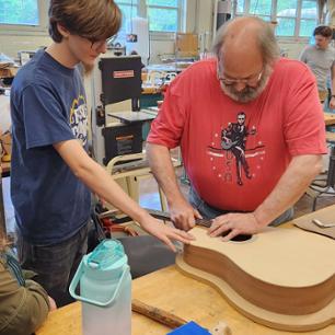 Bill Hemphill with student in Workshop