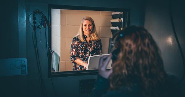 An ETSU audiology student testing equipment with a patient