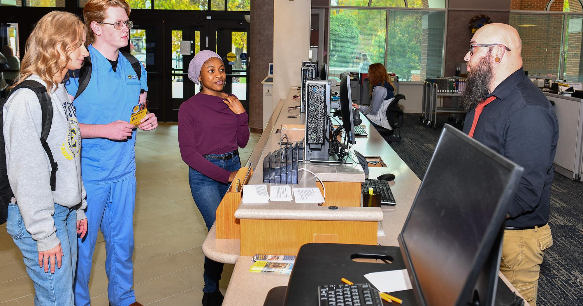 Sherrod Library staff constantly work to assist students in finding what they need.