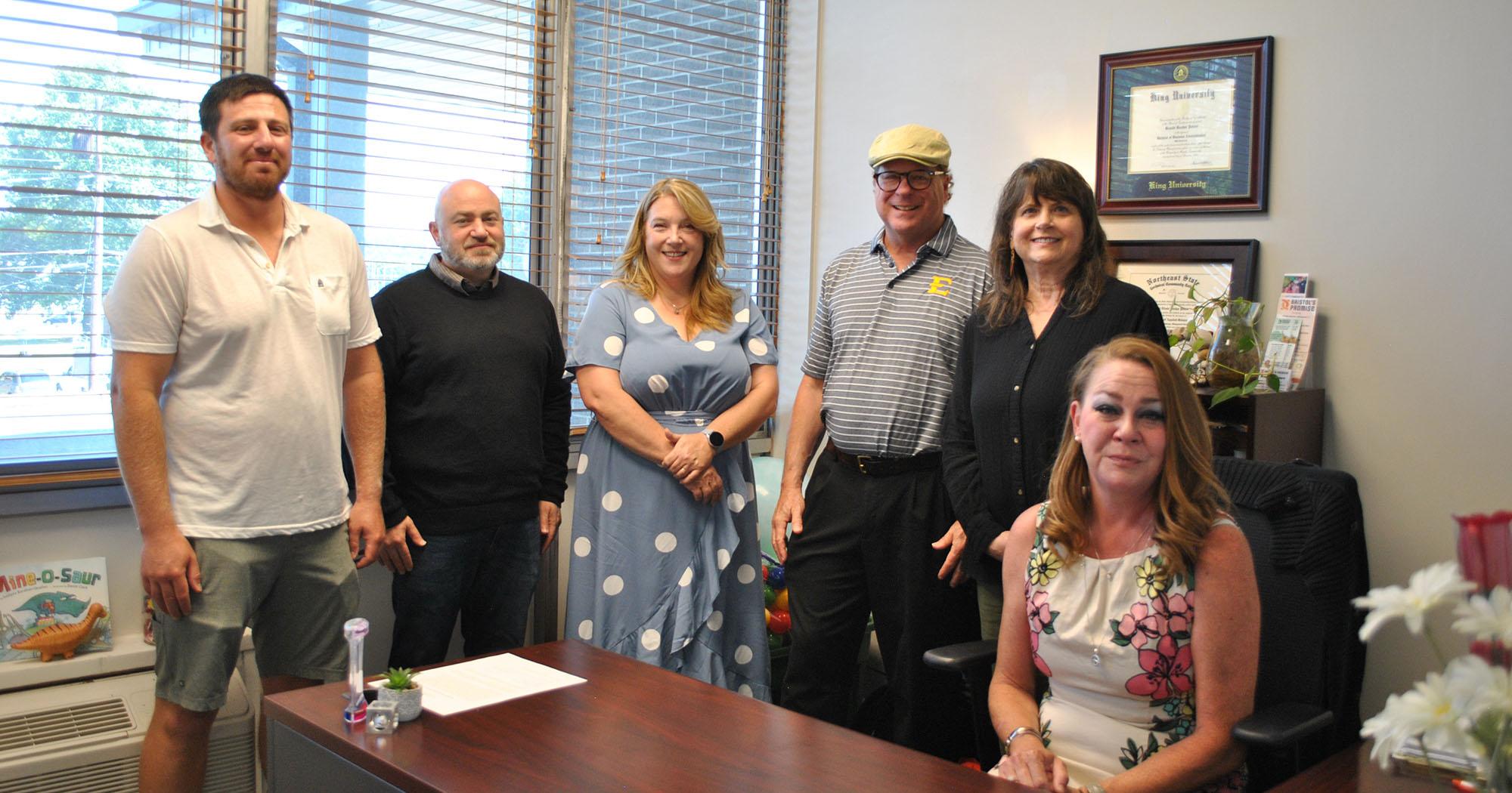 Group photo taken during certificate presentation. Pictured from left-right: Benjamin Schoenberg, Eric Bluestein, Melissa Roberts, Dr. Wally Dixon, Lisa Favre Clark, and Brandi Peters. (Photo credit: Jonathan M. Clark)