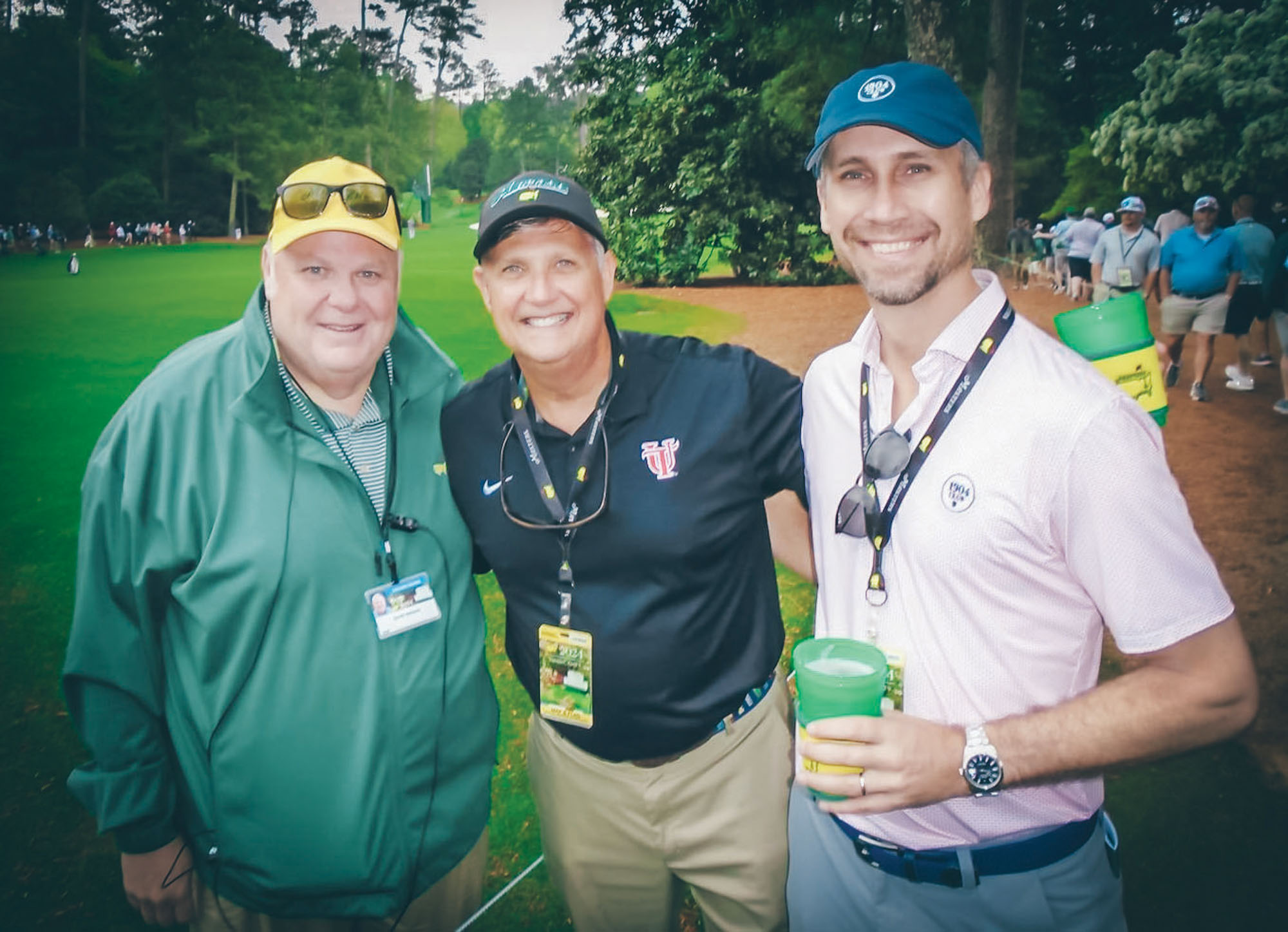 Group photo of Scott Henson, former ETSU student and volunteer for the Masters, with golfers Keith Todd and Scott Gossen.