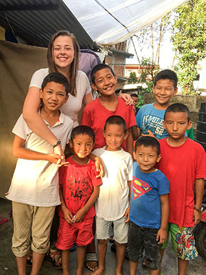 Sydney Ross and boys in Nepal