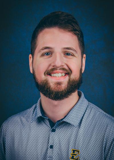 Photo of Logan Mink, MA Marketing and Comminications Manager
