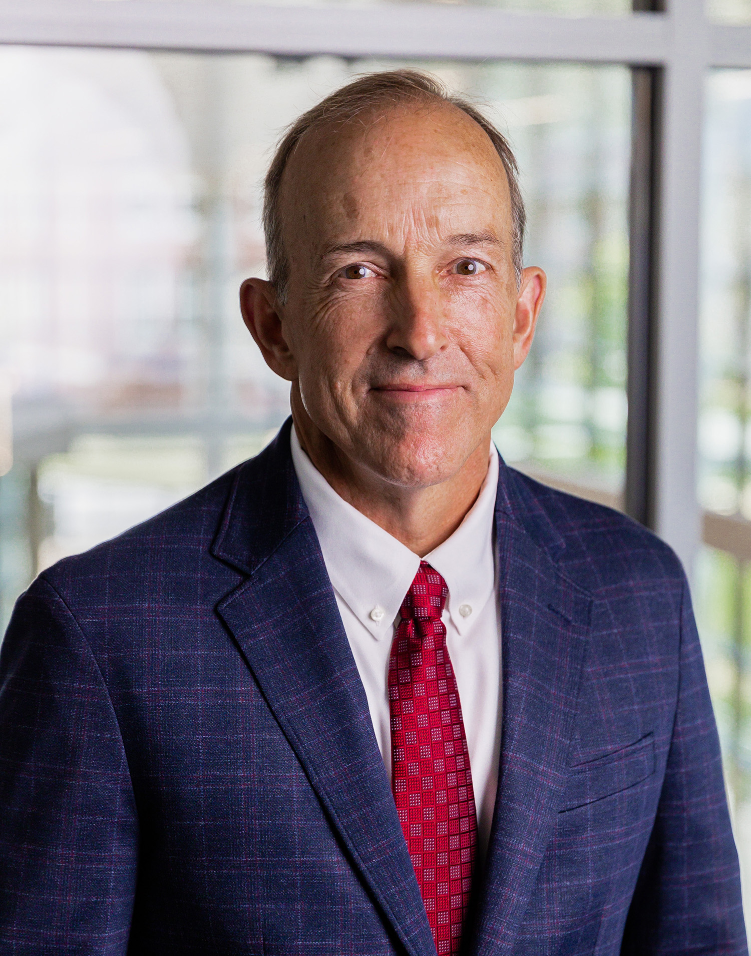 Photo of Lane Rushing Exec. Dir. of Data Analytics & Finance Strategy