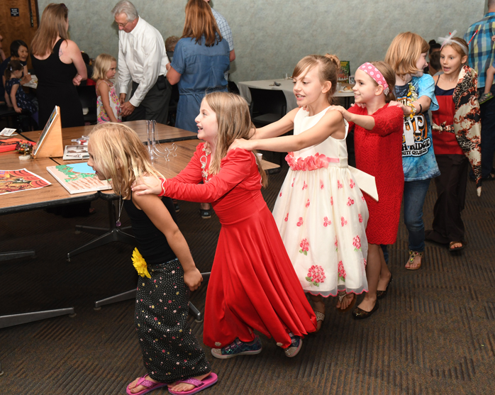 children form a conga line